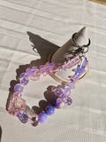 Purple Flower Garden keychain with lilac and blush acrylic and glass beads on white background