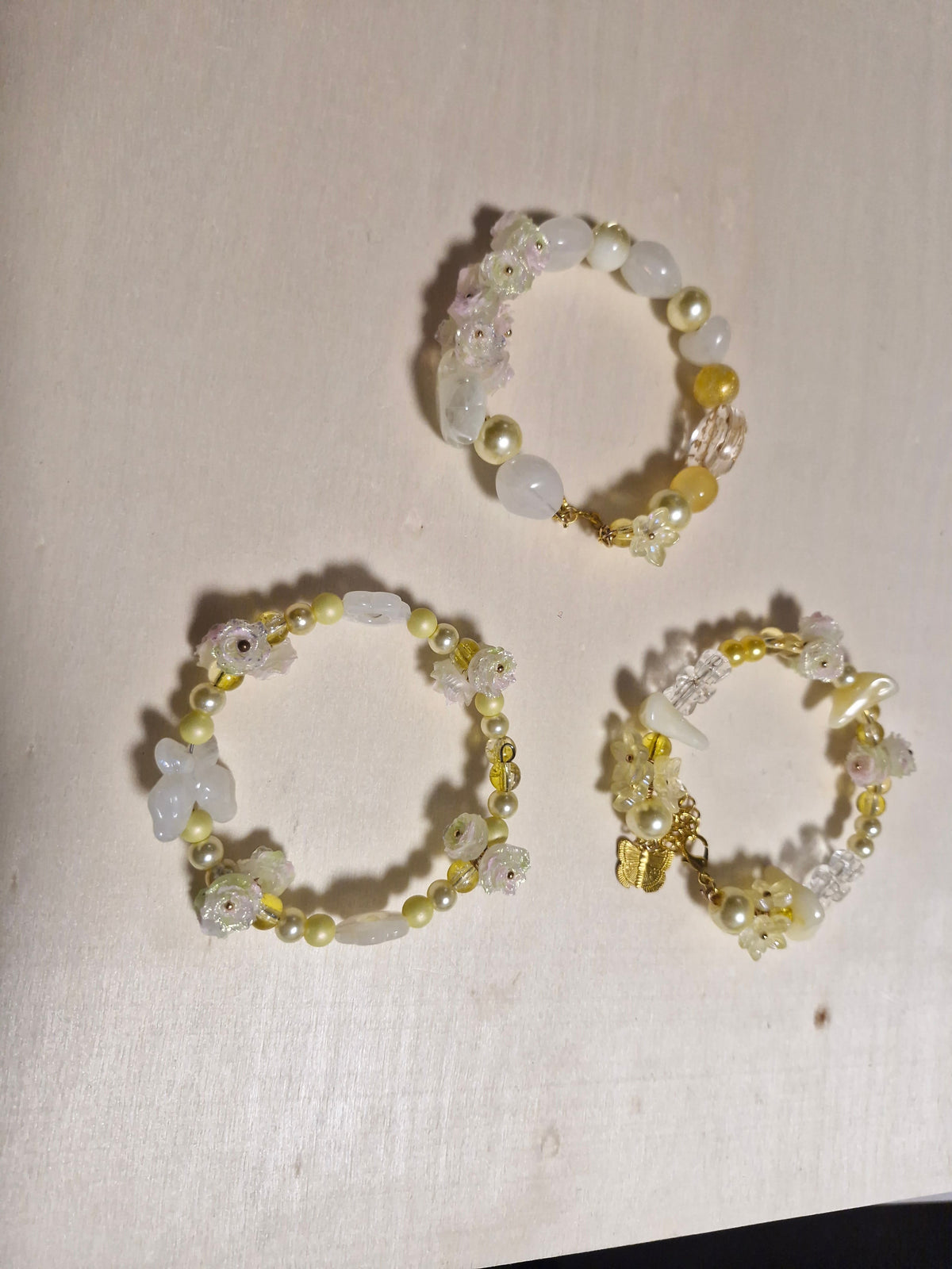 Handmade White Flower & Pearl Beaded Bracelet Set – Gold Butterfly Charm, Set of 3